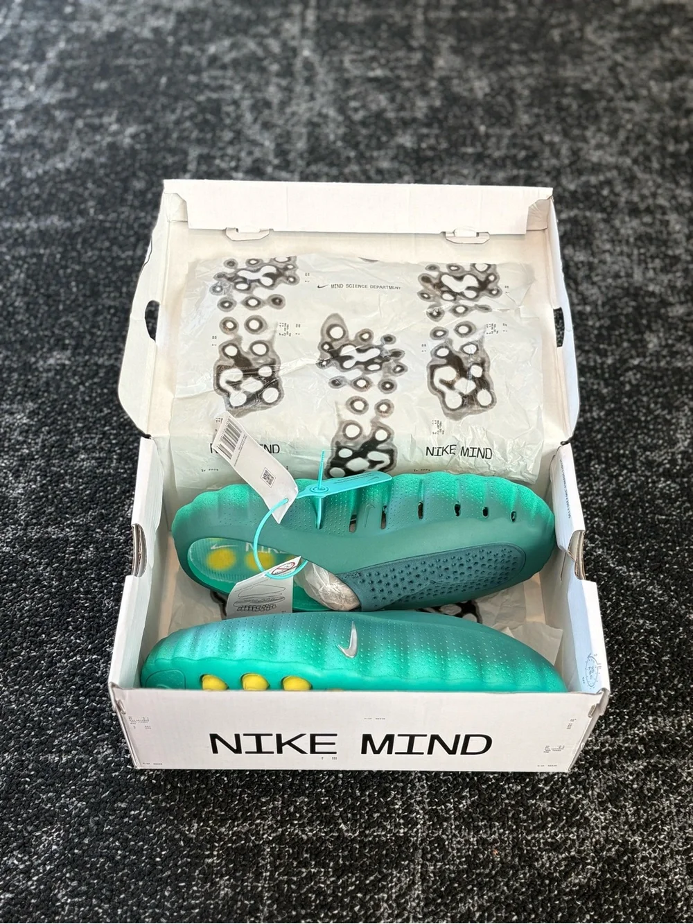 Nike Teal Green Slide Sandals with Silver Swoosh